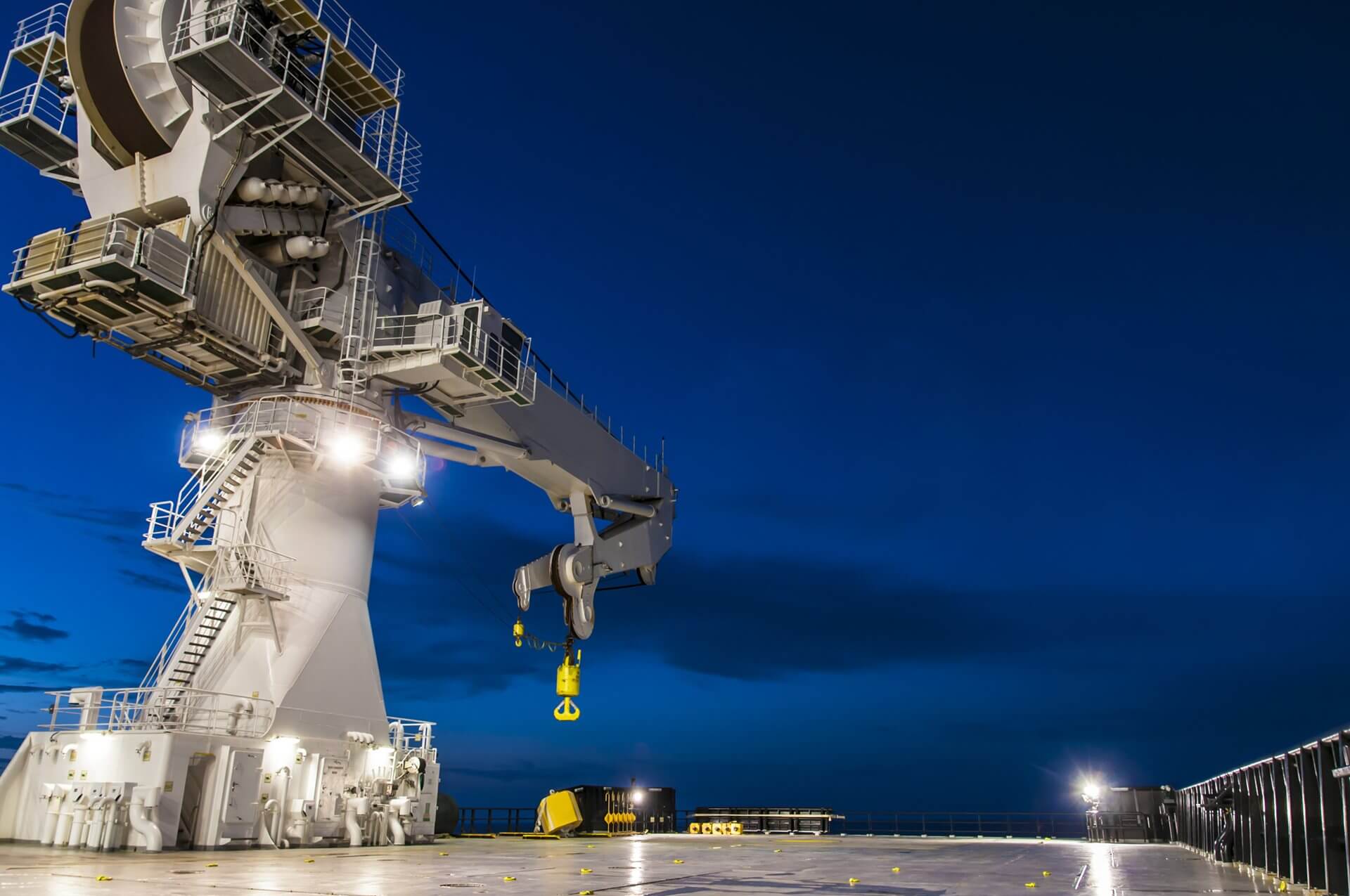 Getty images 1034431874 offshore crane at night 1